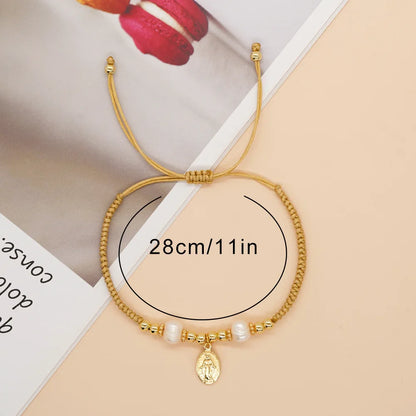 Pulseira de Pérolas com Pingente de Nossa Senhora das Graças