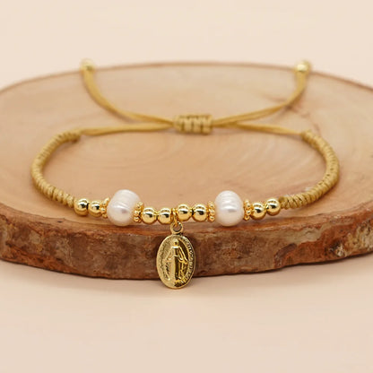 Pulseira de Pérolas com Pingente de Nossa Senhora das Graças