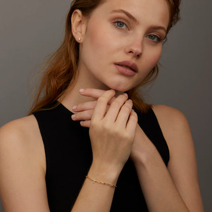 Pulseira Cruz com Strass Banhada a Ouro
